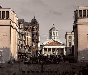 Buildings in city against sky