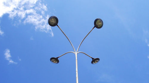 Low angle view of street light against sky