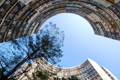 Low angle view of buildings against clear sky