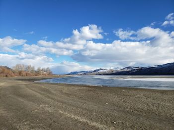 Scenic view of beach against sky