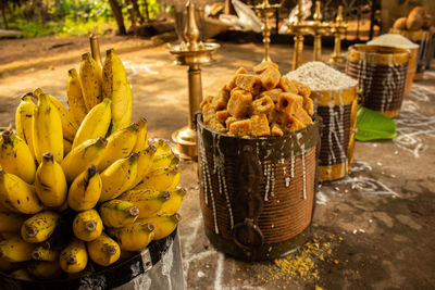 Close-up of fruits in a wooden container drum