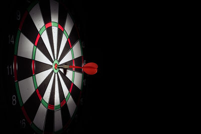 Close-up of umbrella against black background