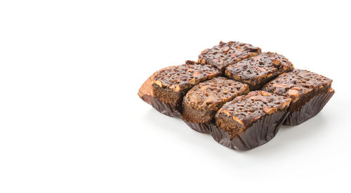 Close-up of cake against white background