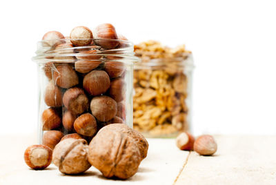 Close-up of candies in jar on table