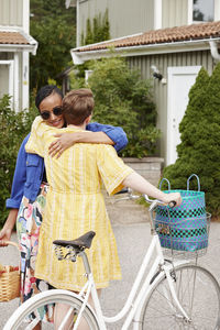 Female friends hugging each other