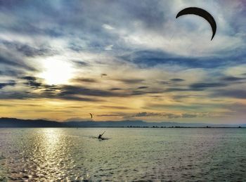 Scenic view of sea against cloudy sky