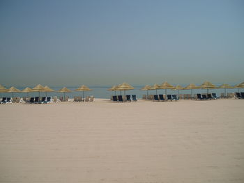 View of beach against clear sky