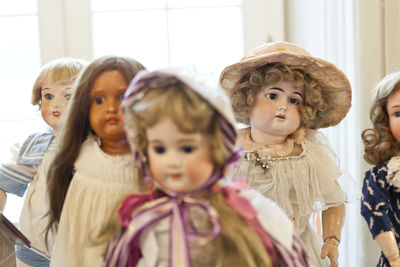 Close-up portrait of a girl with toy