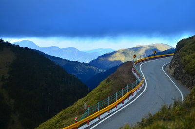 High angle view of light trails on road against sky at night