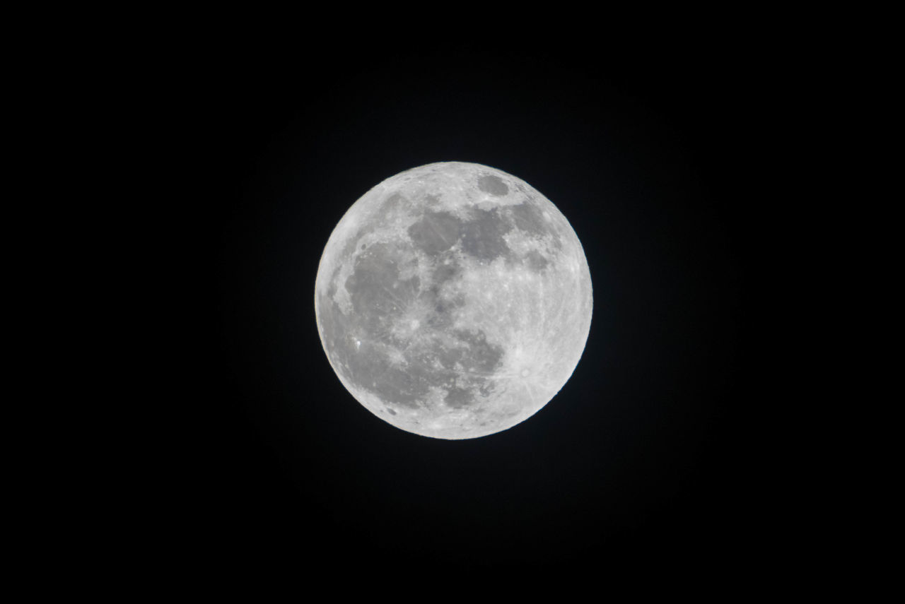 LOW ANGLE VIEW OF FULL MOON AGAINST SKY