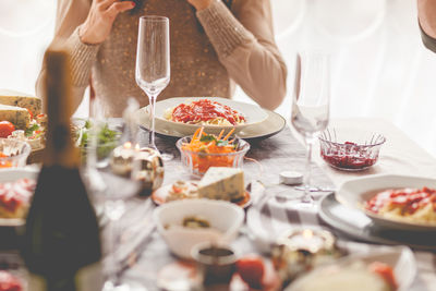 Friends gathering having italian food together