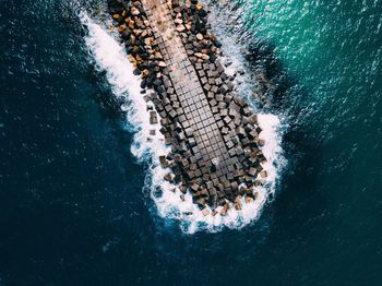 High angle view of swimming pool by sea