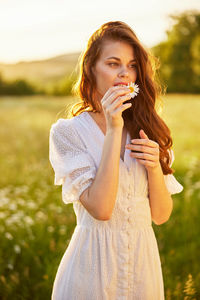 Young woman drinking water