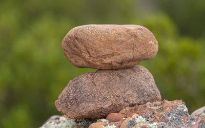 Close-up of stone stack on rock