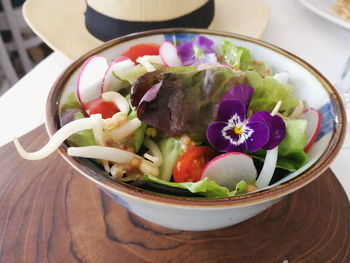 High angle view of salad in bowl on table
