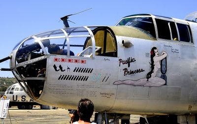 Graffiti on airplane against sky