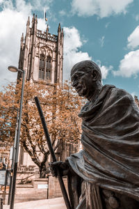 Low angle view of sculpture against sky