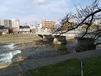 River by city against sky