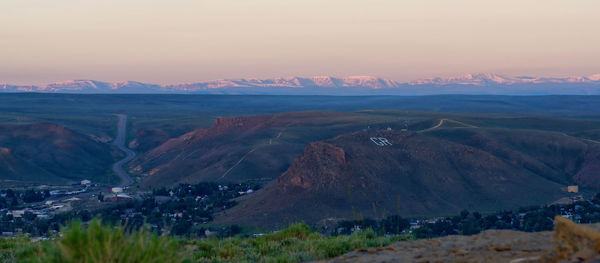 Scenic view of landscape against sky during sunset