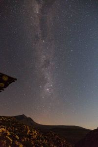 Scenic view of star field against sky at night