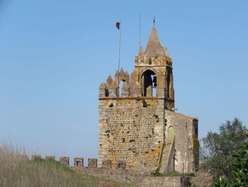 Bell tower against clear sky