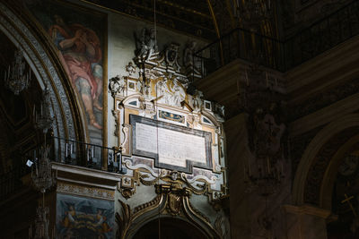 Low angle view of sculptures on old building