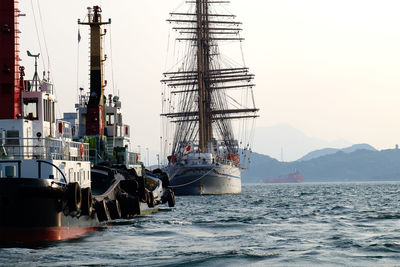 Ships in sea against sky