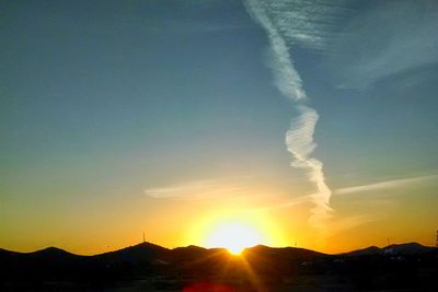 Scenic view of mountains at sunset
