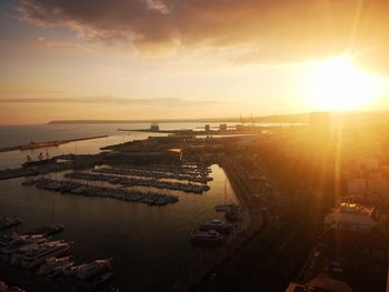 High angle view of cityscape against sky during sunset