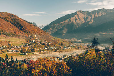 Scenic view of landscape against sky during autumn