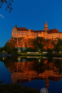 Reflection of buildings in lake