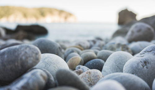 Close-up of stones on beach