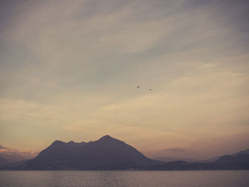 Scenic view of mountains against sky during sunset