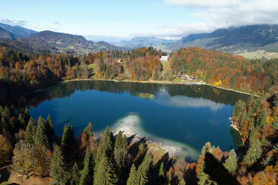 Scenic view of lake against sky during autumn