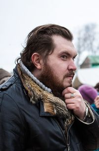 Man standing outdoors during winter