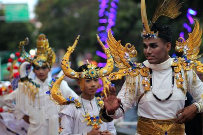 People in traditional clothing during festival