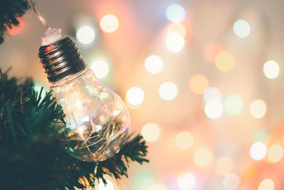 Close-up of illuminated christmas tree