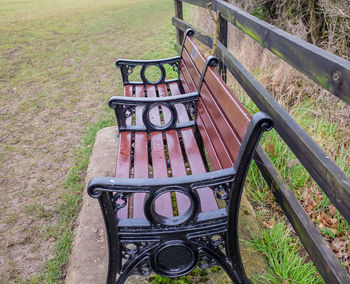 High angle view of empty bench in park