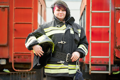 Portrait of firefighter standing outdoors