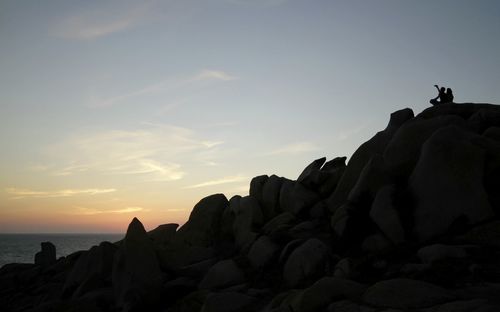 Scenic view of sea at sunset