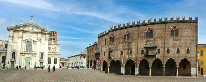 Extra wide view of the ducal palace and the cathedral of mantua