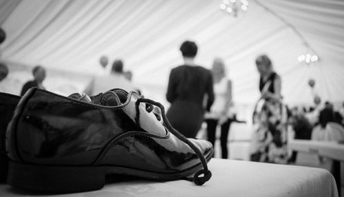 Close up of wedding shoe on table