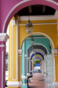 Multi colored arcade at building corridor