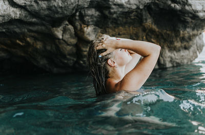 Woman swimming in sea