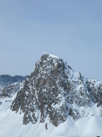 Scenic view of snowcapped mountains against  sky