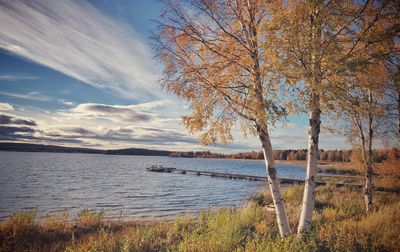 Scenic view of lake against sky during autumn