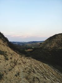 Scenic view of landscape against sky during sunset