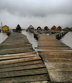 Pier over sea against sky