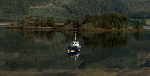Scenic view of lake against mountain