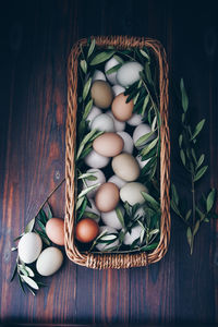 High angle view of vegetables in basket on table